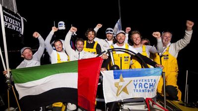 The Abu Dhabi Ocean Racing crew celebrate crossing the finish line to win the Round Britain and Ireland Race on Friday night in a record times. Courtesy Ian Roman