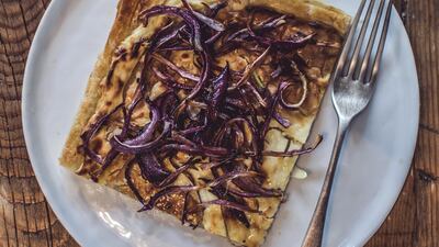 Cream cheese and roasted red onion tart. Photo: Scott Price