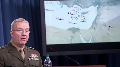 Director of US Joint Staff, Lieutenant General Kenneth McKenzie briefs the press on the strikes at the Pentagon in Washington on April 14, 2018. Saul Loeb / AFP