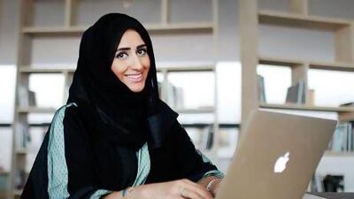 Emirati Sahar Karmostaji at work. She says the new generation of Emirati employees is more educated, responsible and aware of their future, and thus more capable of ridding the workplace of cultural misconceptions. Sarah Dea / The National