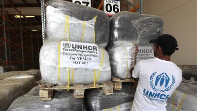A UNHCR worker prepares Yemen relief items for transport at Humanitarian City in Dubai. Jeffrey E Biteng / The National