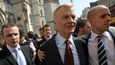 Max Mosley leaves the High Court in central London yesterday after winning a privacy case.
