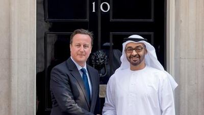 Sheikh Mohammed bin Zayed with the British prime minister at 10 Downing Street yesterday. Ryan Carter / Crown Prince Court - Abu Dhabi