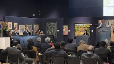 Auctioneer Ralph Taylor (pictured) of Bonham's Auctioneers on New Bond Street, London, UK, sells works of art from the Abraaj collection, which include Manjit Bawa's oil on Canvas 'Untitled' and Rashid Rana's 'Red Carpet'. Picture by Ben Stevens / i-Images