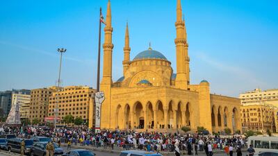 People participate in the Eid al-Fitr prayers outside Al-Amin Mosque in downtown Beirut, Lebanon. EPA