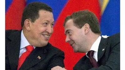 The Russian president Dmitry Medvedev, right, talks nuclear with his Venezuelan counterpart Hugo Chavez. Alexander Zemlianichenko / AP Photo