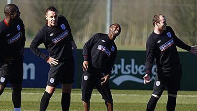 From left, Carlton Cole, John Terry, Shaun Wright-Phillips and Wayne Rooney in training.