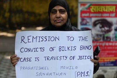 An activist at a protest against the release of men convicted of gang-raping Bilkis Bano during the 2002 riots in Gujarat, on August 18. AFP