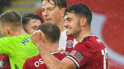 John Egan of Sheffield United, right, scored an injury-time winner against Wolverhampton Wanderers on Wednesday. EPA