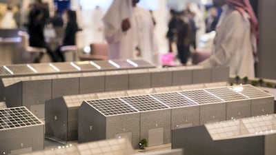 Visitors look at a model at Gitex Technology Week 2018. Reem Mohammed / The National