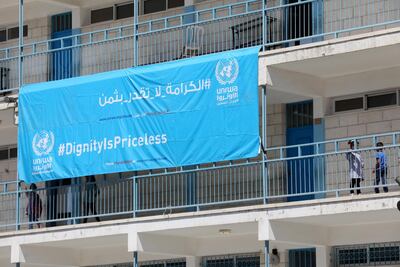 Palestinian children arrive to their UNRWA school during the first school day at Al Jalazoun refugee camp near the west bank city of Ramallah on August 29, 2018. EPA