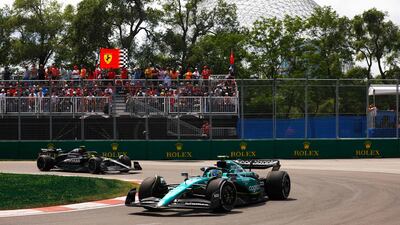 Fernando Alonso ahead of Lewis Hamilton during the Canadian GP. AFP