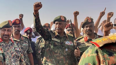 Sudanese military leader Gen Abdel Fattah Al Burhan visits Al Afadh camp, in Northern State. Getty Images