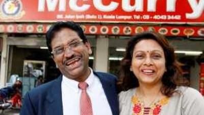The restaurant owner AMSP Suppiah and his wife Kanageswary celebrate a court victory over the US fast food giant McDonald's in Kuala Lumpur.