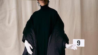 Many Balenciaga signatures were revisited, such as this flattened, wide-brimmed hat and stole.