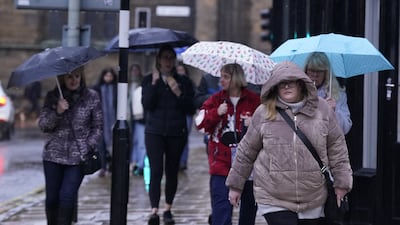 People walk in the rain in York. PA