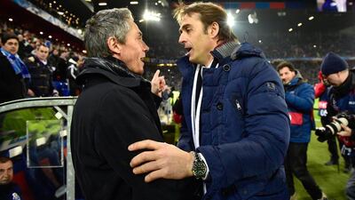 Basel coach Paulo Sousa, left, and Porto counterpart Julen Lopetegui greet each other before the start of their Uefa Champions League last-16 first leg. Michael Buholzer / AFP