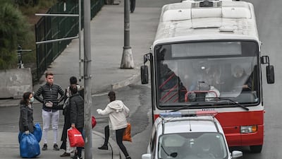 Released women prisoners meet their families as they get off a bus near Bakirkoy women's prison in Istanbul. AFP
