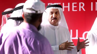 Saqr Ghobash, Minister of Human Resources and Emiratisation, took the Know Your Rights message to Mussaffah and urged workers there to learn and foster a sense of harmony. Delores Johnson / The National