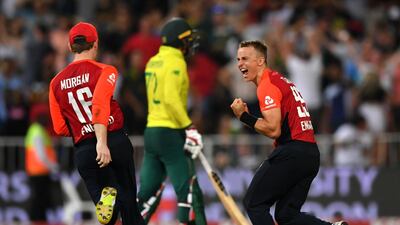 England's Tom Curran celebrates winning the second T20 against South Africa at Kingsmead Stadium in Durban. Getty Images