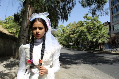 Nada Al Ahdal, at age 16 dressed as a child bride, fled home after her parents tried to force her to marry. 'I knew that white wedding dress would burn me like it did my aunt and sister,' she says. Photo: Nada Al Ahdal
