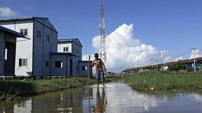 Rakhine childern play near a telecommunications tower at Sat Yoe Kya Ward, Sittwe, Rakhine state, Myanmar, 22 June 2019. EPA