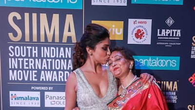 Shriya Saran kisses her mother Neerja Victor Besa / The National