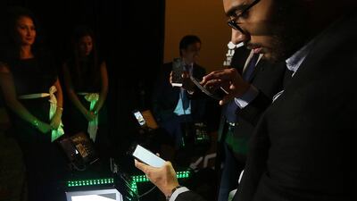 Customers choeck out Xolo Android smartphones during their launch in Dubai. Satish Kumar / The National