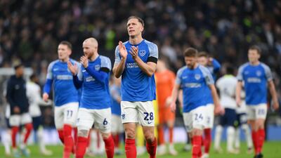 Michael Morrison of Portsmouth acknowledges the fans. Getty