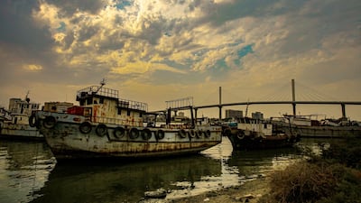 Scrapped boats wait to be recycled in Shatt al-Arab waterway near Basra, Iraq. AP Photo