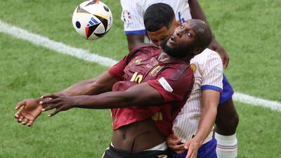 Romelu Lukaku of Belgium and William Saliba of France battle. EPA