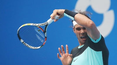 Rafael Nadal returns a shot to Wu Di on Tuesday during their first round match at the ATP China Open in Beijing. How Hwee Young / EPA / October 6, 2015