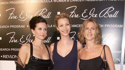 Courteney Cox, Lisa Kudrow and Jennifer Aniston, in a spaghetti-strapped gown, attend the Fire and Ice Ball at the Beverly Hilton Hotel in Los Angeles, California, on November 12, 2000. Getty Images