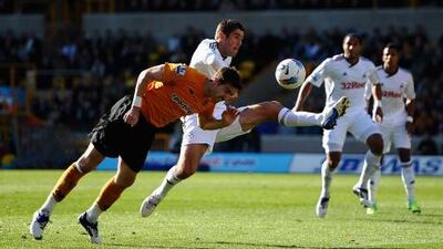 Wolves left it late to get a point against Swansea.