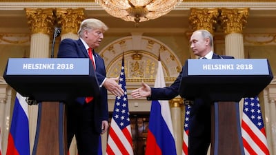 President Donald Trump and President Vladimir Putin shake hands in Helsinki, Finland. Reuters.