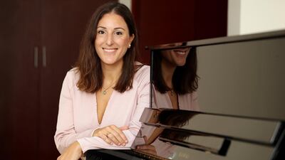 Mercedes Bassuto recovered quickly from her job loss by pursuing her passion for music. Chris Whiteoak / The National