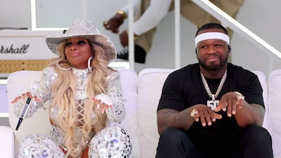Mary J Blige and 50 Cent share a moment during the Super Bowl Halftime Show. Getty