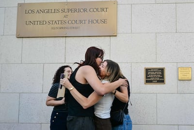 Parents and family members of victims embrace after the jury found Meta and YouTube liable in the social media addiction trial. (AFP