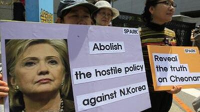 Protesters hold banners during a rally to oppose US Secretary of State Hillary Rodham Clinton's visiting in front of the Foreign Ministry in Seoul, South Korea, Wednesday, May 26, 2010.