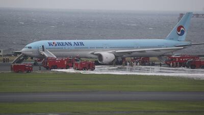 Dozens of fire engines were deployed to the scene and have almost put out the fire. Koji Sasahara / AP Photo