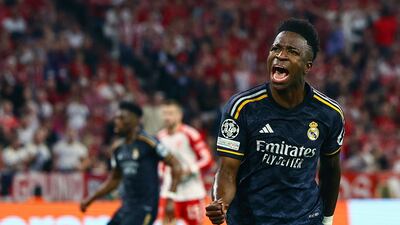 Vinicius Junior celebrates after scoring the equaliser for Real Madrid at the Allianz Arena. EPA
