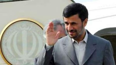 The Iranian President Mahmoud Ahmadinejad waves as he arrives at Kuala Lumpur International Airport in Sepang, Malaysia, July 7 2008. Mr Ahmadinejad told a rally in the southwestern province of Kohgelouyeh-Boyerahmad today that his country would not yield in the crisis over its nuclear drive.