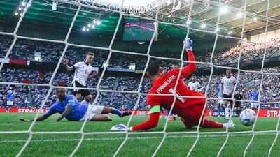 Germany's Joshua Kimmich scores the opening goal in Germany's 5-2 victory against Italy. AP