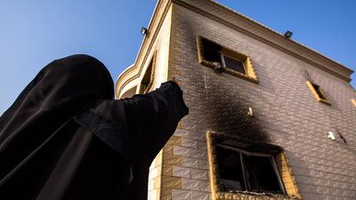 Witnesses reported seeing a plume of smoke and then flames from the villa. Fire-fighting teams from Al Rashidya station arrived within minutes and quickly brought the blaze under control. Victor Besa for The National