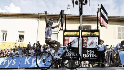 France's Romain Bardet celebrates as he crosses the finish line to win Stage 18 of the Tour de France on Thursdsay in Saint-Jean-de-Maurienne, France in the French Alps. Alex Guigon / AFP