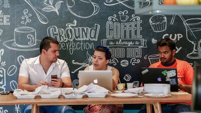 From left: Hussam Mohsineh, Pam Ela and Sajjad Kamal at the Dubai Startup Weekend at Astrolabs Dubai. Victor Besa for The National