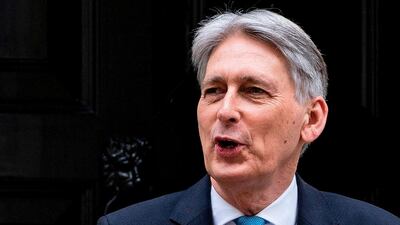 Finance minister Philip Hammond said PhD-level jobs would be removed from a visa cap. AFP.