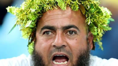 A spectator watches the action in Dubai.