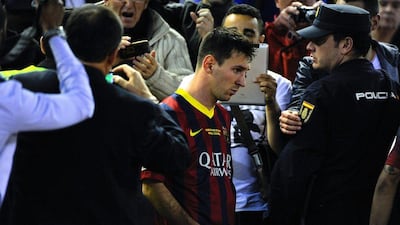 Lionel Messi of Barcelona looks down after being defeated during the Copa del Rey Final between Real Madrid and FC Barcelona at Estadio Mestalla on April 16, 2014 in Valencia, Spain. David Ramos/Getty Images
