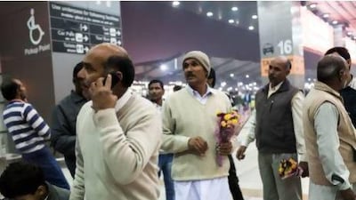 27 year old sailor Jaswinder Singh's father Jagmal Singh (center) stands amongst his extended family as they wait to receive him from the Delhi airport on 29 December 2012 after his release from almost 33 months of being held hostage by Somali pirates who hijacked MV Iceberg 1, a Dubai-owned ship, off the Yemeni coast in March 2010. It was the longest-held hijacked ship until the Puntland Maritime forces released it and 22 crew members on 23 December 2012. Photo by Suzanne Lee / The National